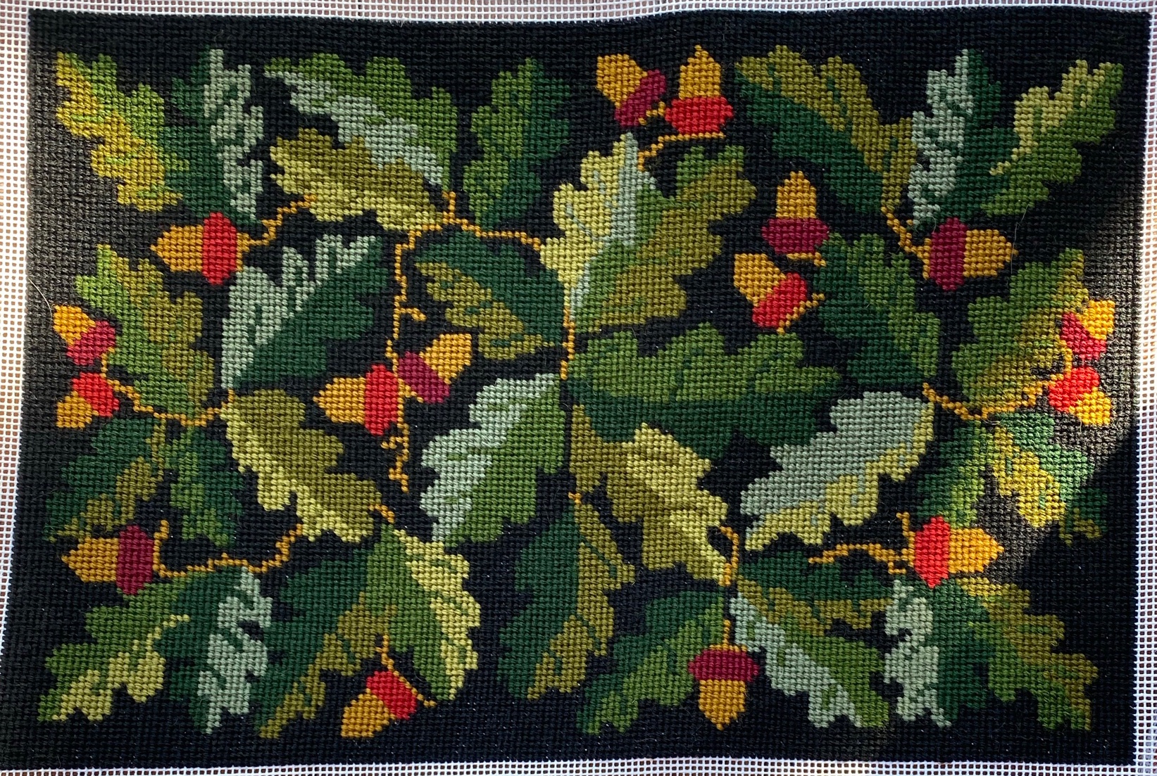 Lumbar pillow needlepoint facing with acorns and oak leaves